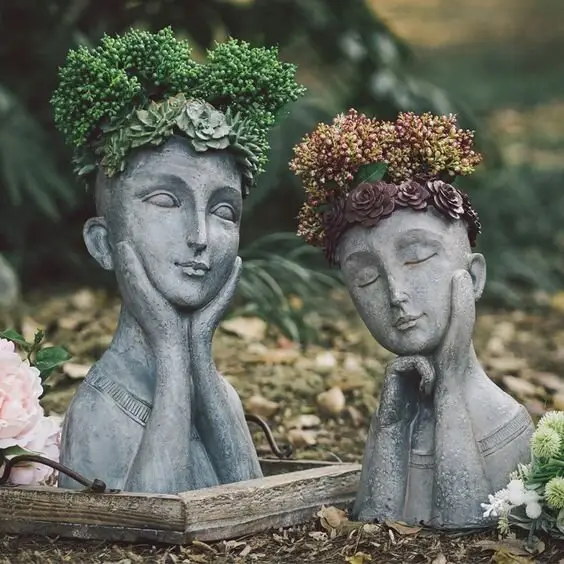 concrete head garden planters