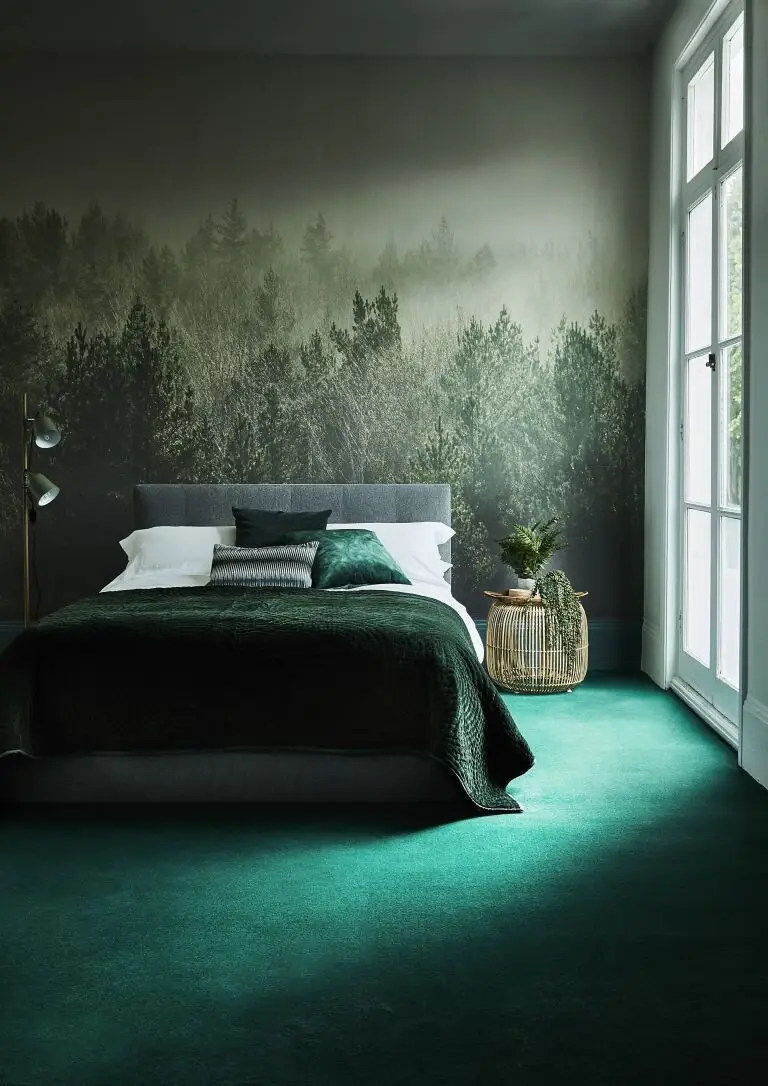 Green Envy bedroom: Emerald carpet, a forest mural, bedding in mixed greens