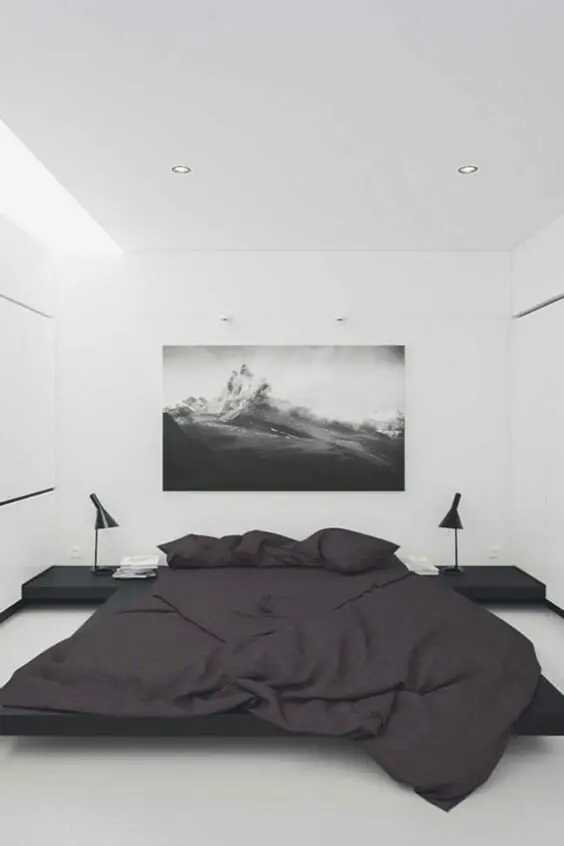 Bachelor’s Retreat bedroom: White walls, white ceiling, white floor, with the storage recessed and the side tables built in