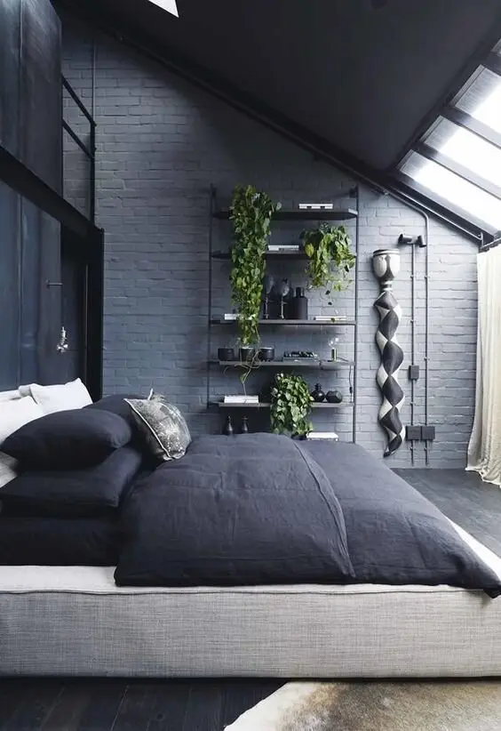 Modern Industrial bedroom: Brick walls, steel pipe, bare floors, then glass walls and skylights so it doesn't feel