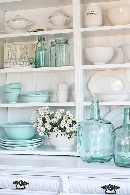 Jugs and Jars farmhouse kitchen: Milk jugs, mason jars, old tins and earthenware, collected slowly. Op shops price these at