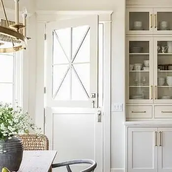 Dutch Door Efficiency farmhouse kitchen: A Dutch door splits in half: top open for light and breeze, bottom closed to keep