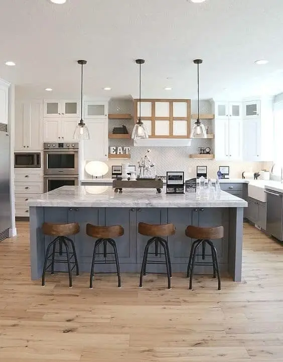 Modern Grey farmhouse kitchen: Greys layered from cabinet to wall, pulled back to farmhouse with glass pendants, rustic