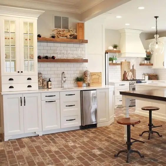 Charming Brick farmhouse kitchen: A brick floor in warm terracotta tones. Harder underfoot than timber and it needs sealing