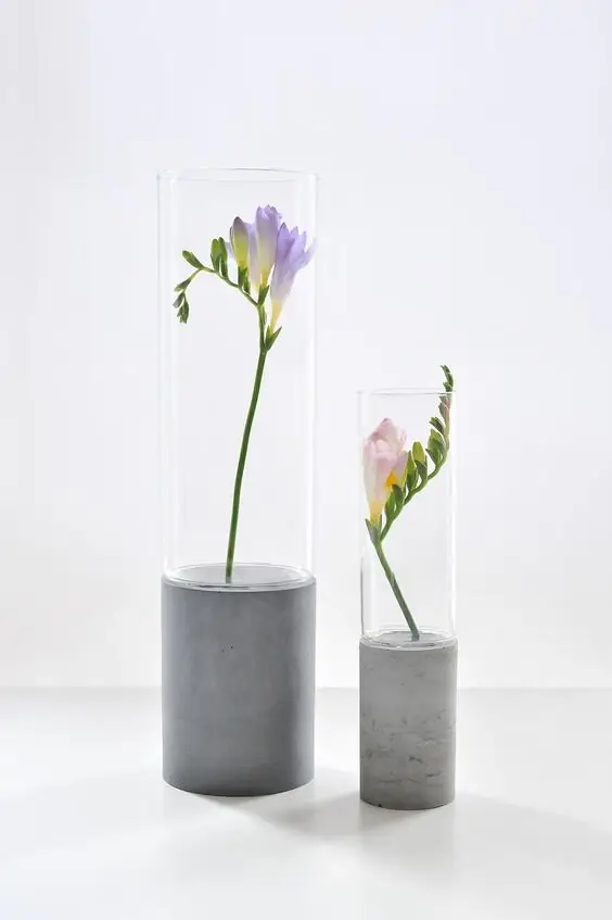 concrete and glass vase