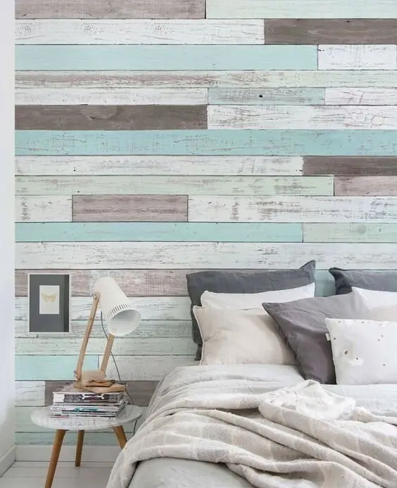 Shabby Chic Shiplap coastal bedroom: An accent wall of unmatched, imperfectly finished planks. You can build it from pallet