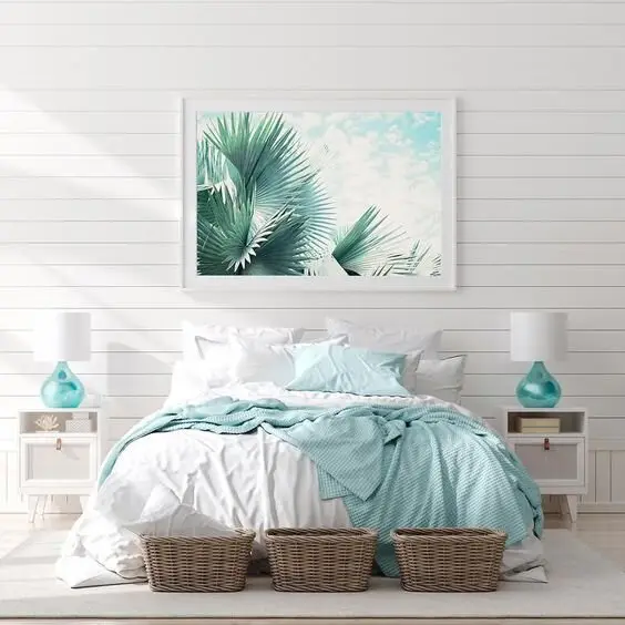 Summer Fronds coastal bedroom: White shiplap, one oversized frond print, glass jar lamps and green-trimmed white linen