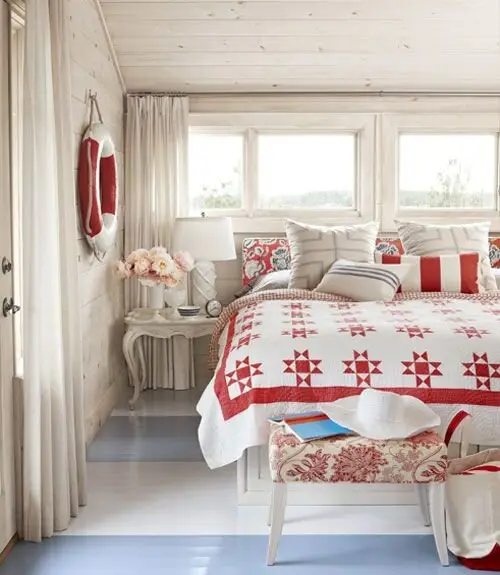 Seaside Shack coastal bedroom: Shiplap walls and ceiling, a box bed with storage inside, and a few graceful vintage pieces