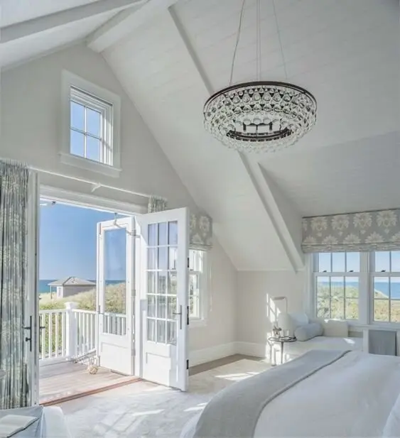 Walkout Balcony coastal bedroom: A bedroom opening onto its own balcony. Even a tiny one changes how the room feels, and on