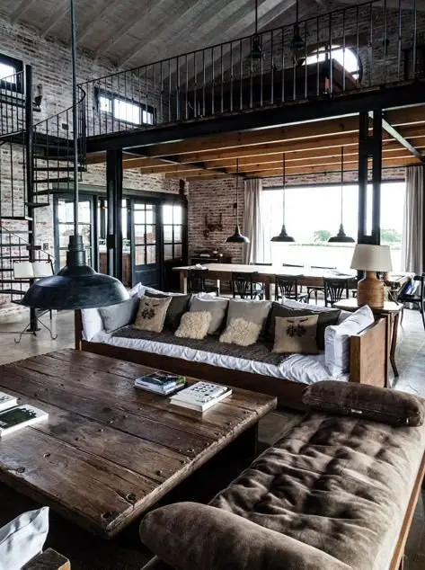 The Loft industrial living room: Lofts are common to apartments converted from industrial buildings