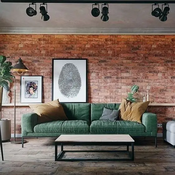 Green Velvet industrial living room: Add colour and style to your industrial-themed living room with this green velvet sofa