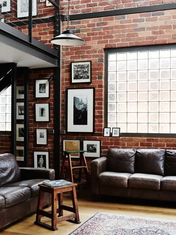 Red Brick Charm industrial living room: This is a classic industrial interior design updated with modern aesthetics