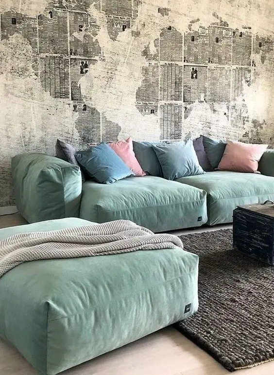Pastel and Concrete industrial living room: The raw, hard, and edgy industrial look of this living room is tempered by bright and soft pastels!